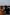 A man and woman admiring the distant view of the city from St Kilda Pier, Melbourne, Victoria © Visit Victoria